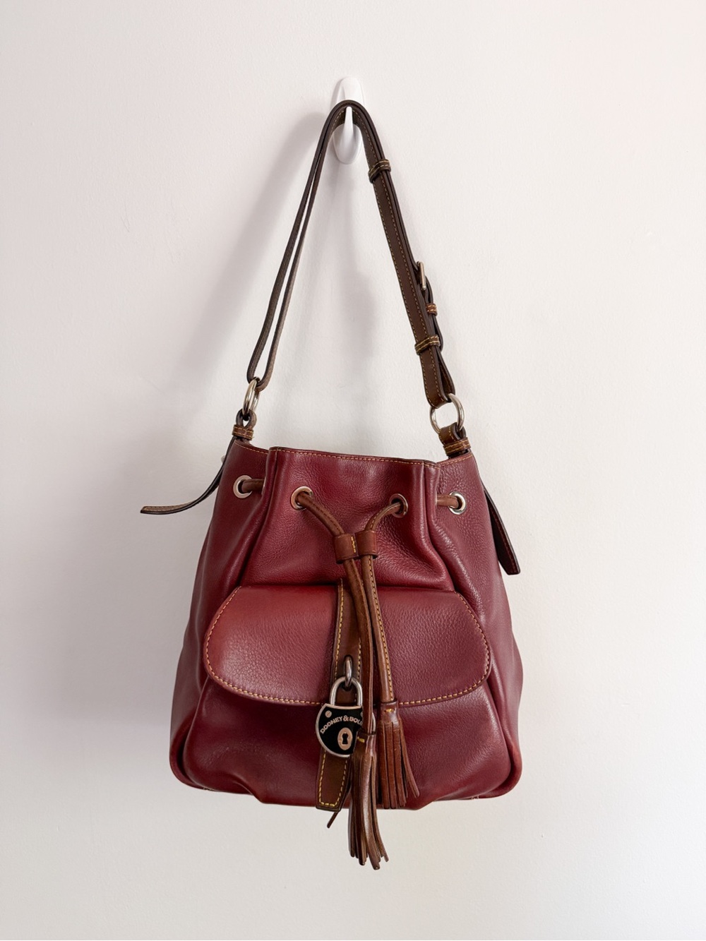 Vintage Dooney & Bourke Samba leather drawstring bag in bordeaux
